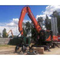 Колесный перегружатель Doosan Dx210wa с грейферным захватом и магнитной шайбой